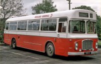1385R in NBC dual-purpose red and white livery