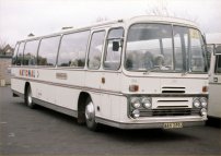 AAX259J in National white coach livery with Greenslades