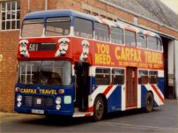 OUD483T in allover advertising livery for Carfax Travel