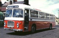 RDV420H in NBC red and white dual-purpose livery with Devon General fleetnames